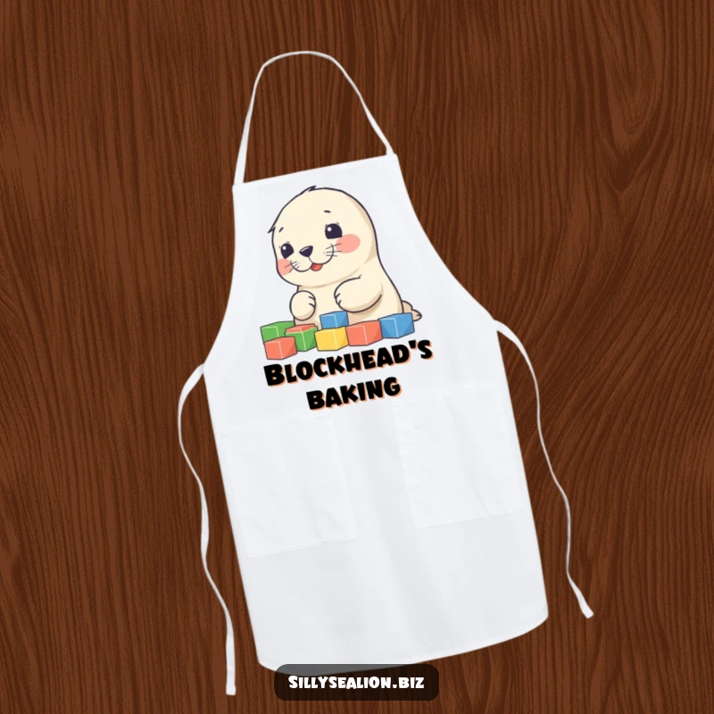 Funny sea lion pup apron showing a cute pup focused on sorting colorful blocks, ready for kitchen duties with a smile.