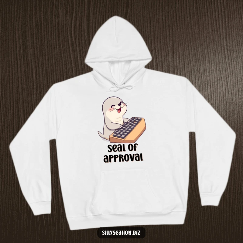Funny sea lion hoodie depicting a cute sea lion character intensely typing on an enormous keyboard, ideal for coders.