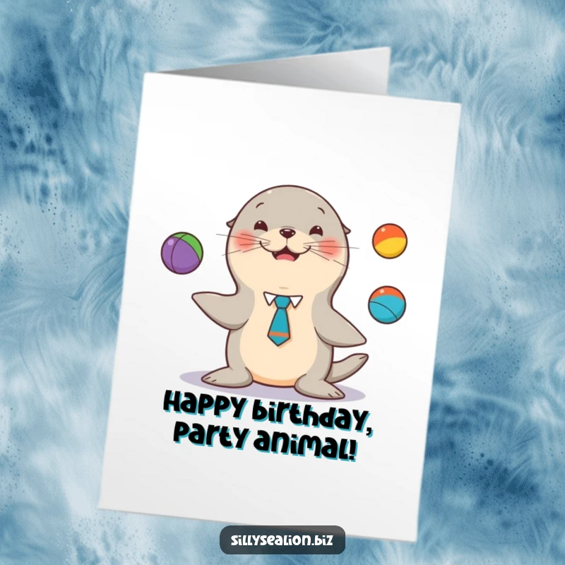 Funny Free Printable Birthday Card of a sea lion pup in a tiny tie, skillfully juggling three colorful balls with a happy expression.