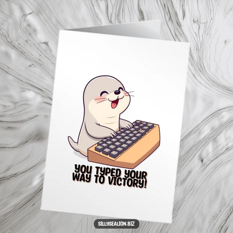 Funny Free Printable Congrats Card showing a cute sea lion character rapidly typing on a giant keyboard.